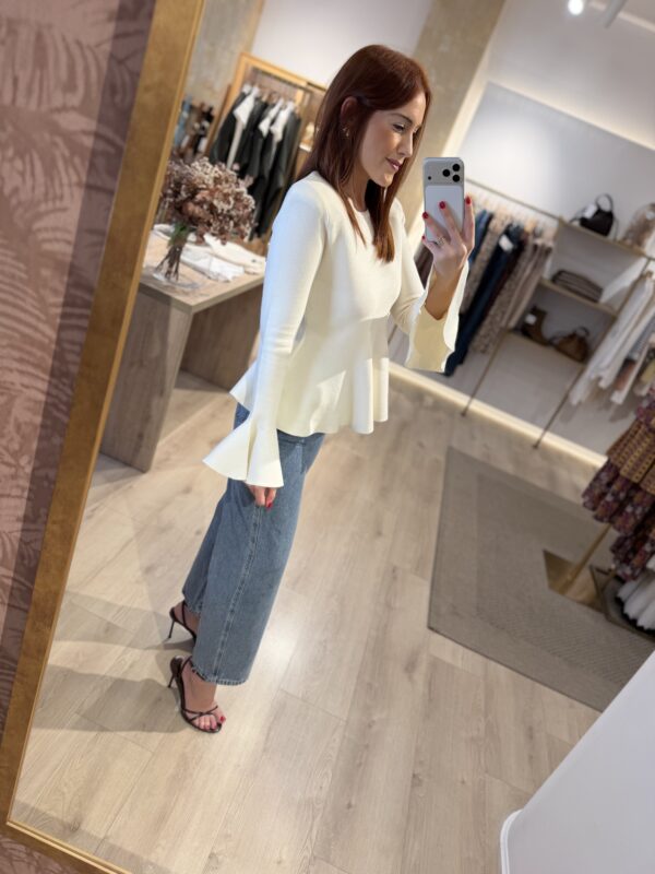 Jersey crudo peplum.
